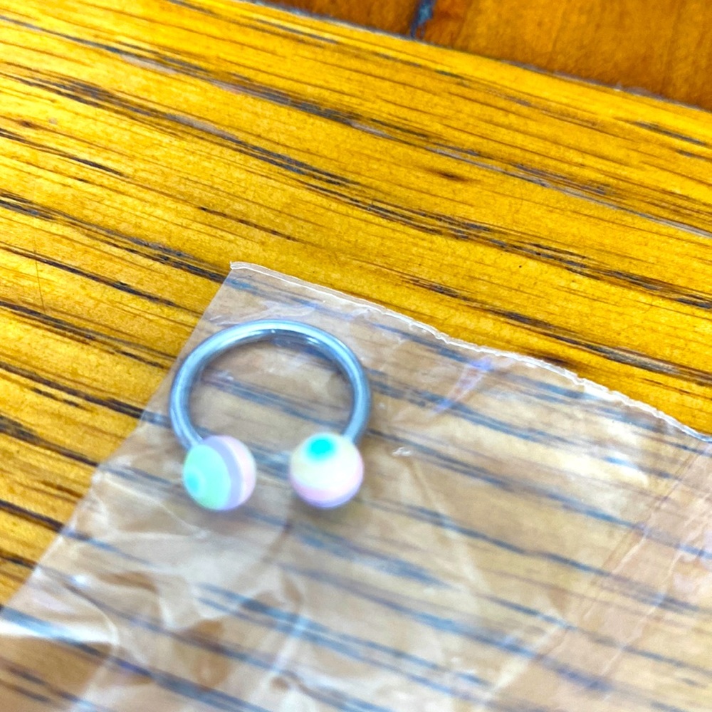 Pastel rainbow eyebrow ring